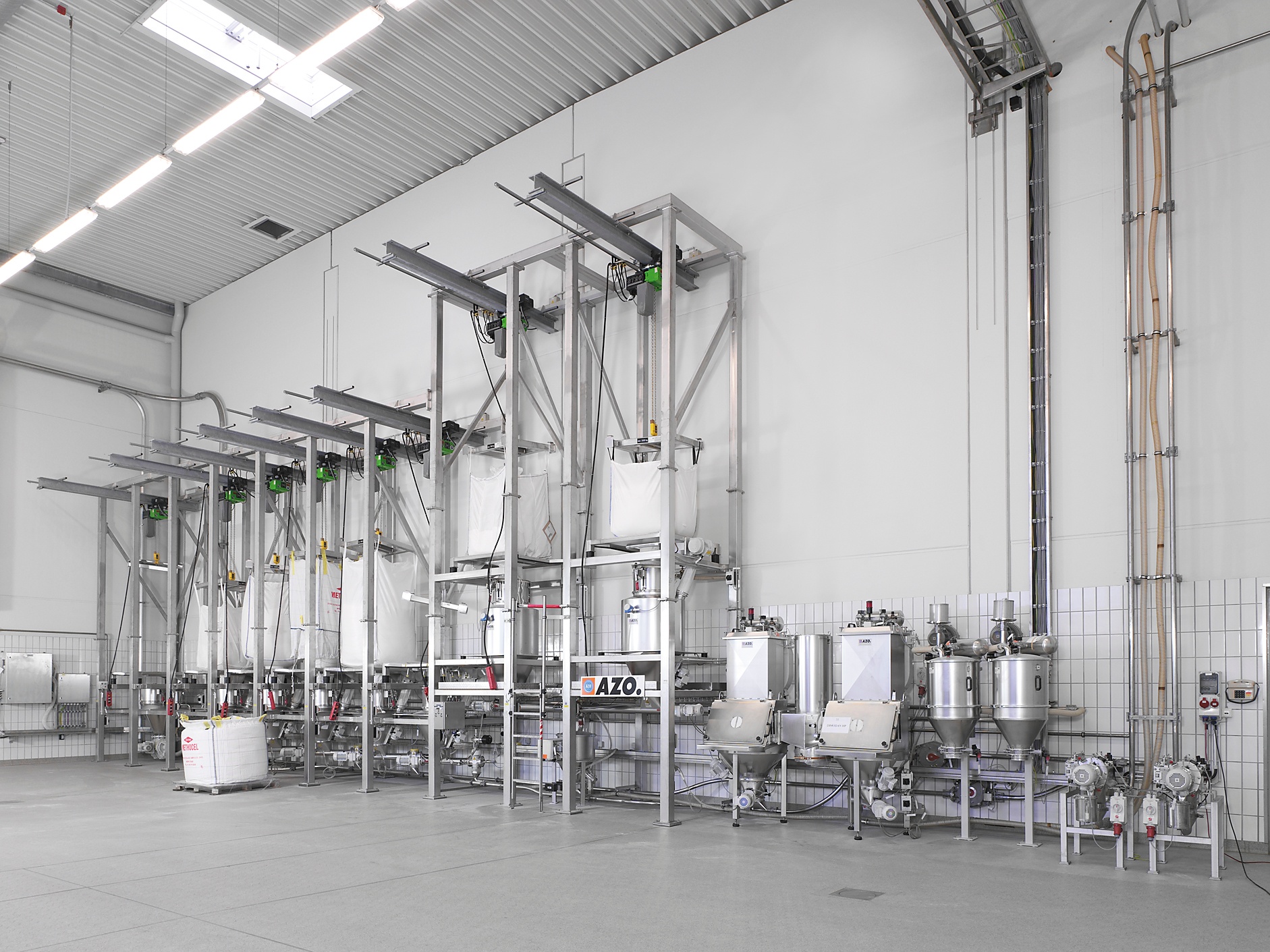 AZO super sack unloaders are modular systems with hoist, storage, vibration and other features