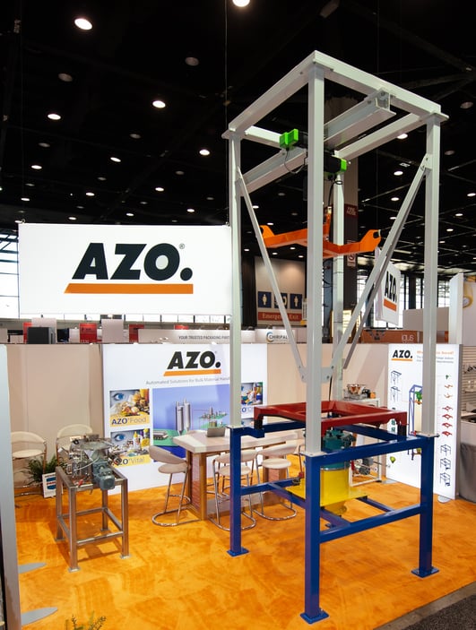 AZO booth at Pack Expo with modular color coded big bag unloader
